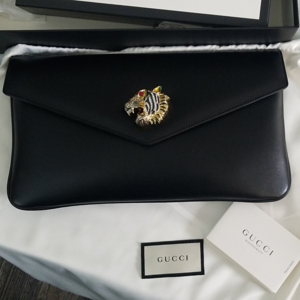 GUCCI LINEA RAJAH LEATHER CLUTCH